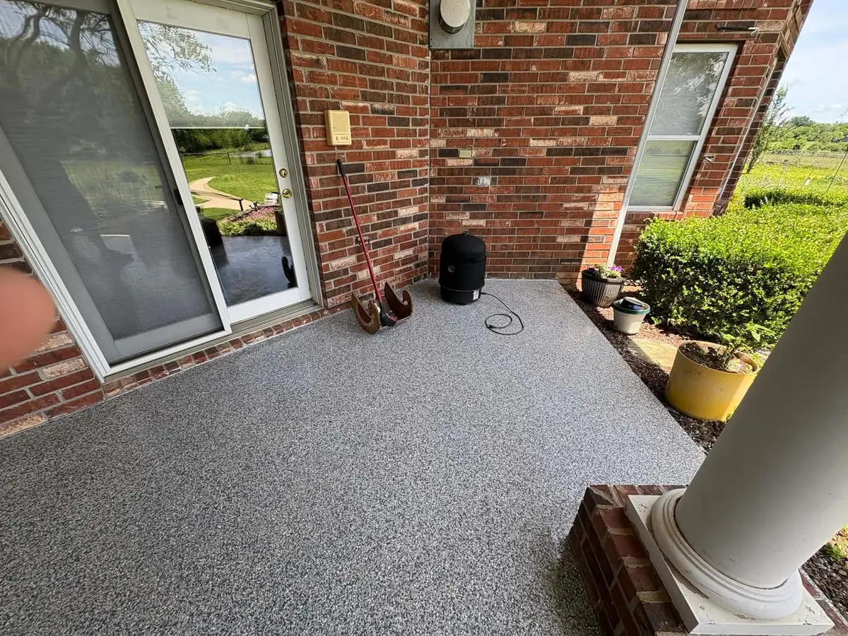Flake epoxy patio coating on a covered brick patio by Epoxy Dept