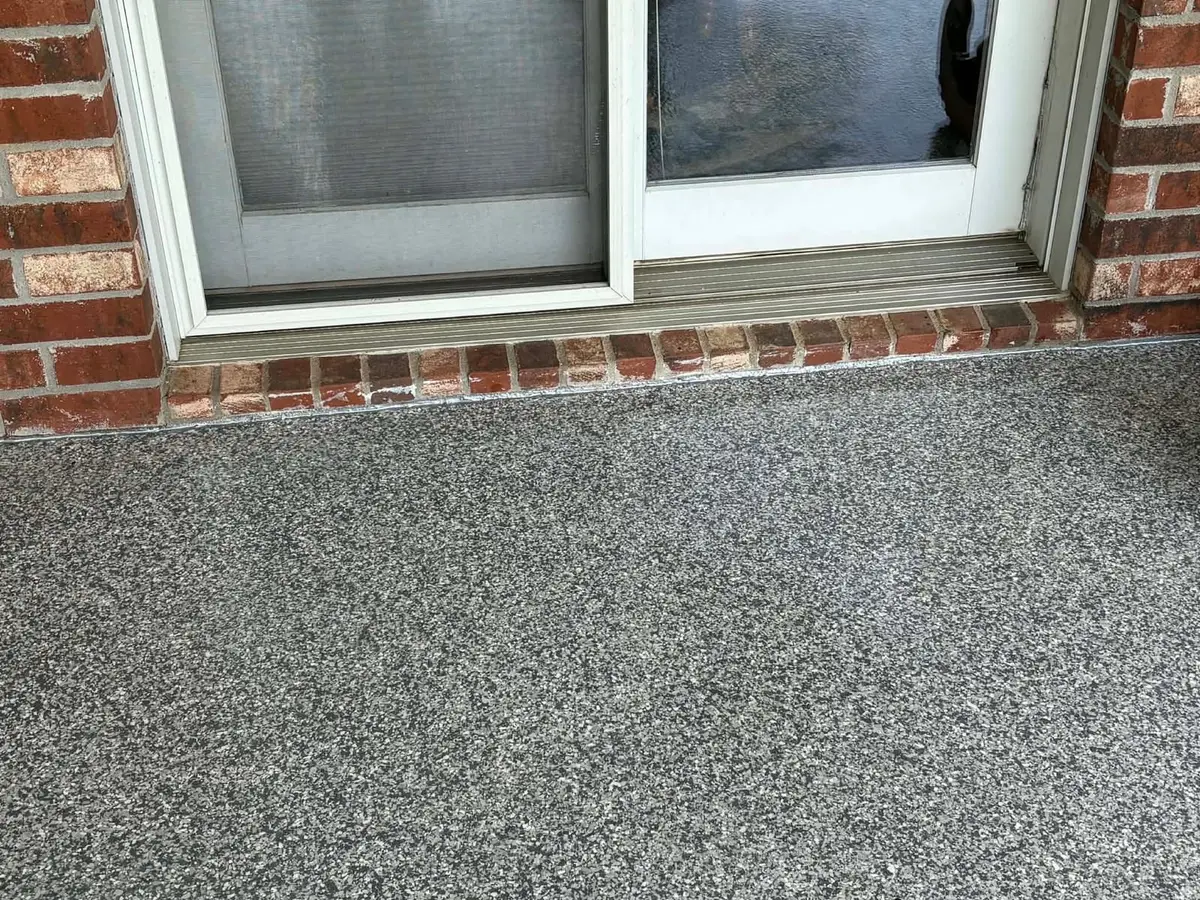 Close-up of a flake epoxy patio finish by Epoxy Dept