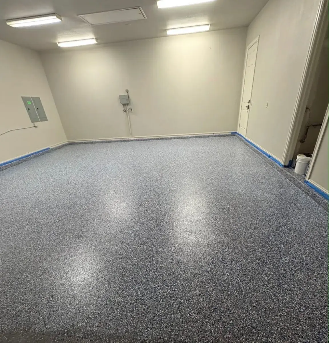 Blue and gray flake epoxy garage floor by Epoxy Dept